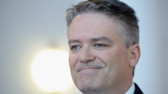 Cormann on public service cuts: work harder but keep your staff