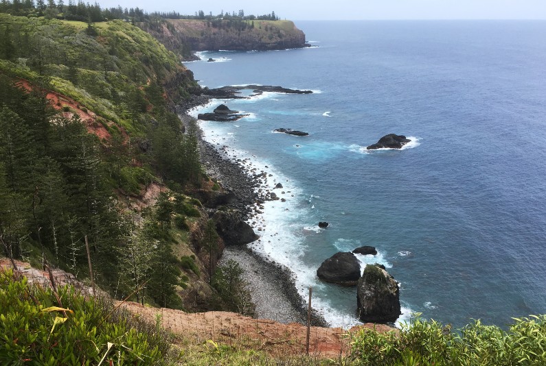 The federal government's failing of Indigenous Australians and Norfolk Islanders risks undermining Australia's Pacific Step-up policy. A general view of shingle beach, Norfolk Island.