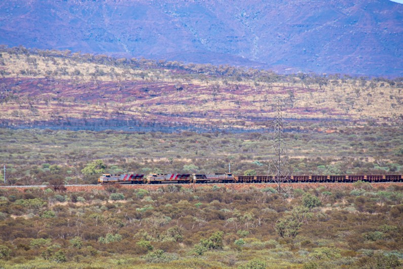 Long train at Karijini National Park transporting iron ore from Marandoo Mine Site towards the coast.