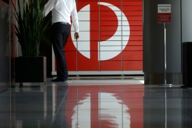 Holgate accepts payout, agrees to drop legal claims against Australia Post