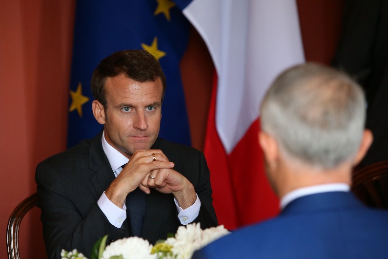 President of France Emmanuel Macron speaks with Australian Prime Minister Malcolm Turnbull during a meeting at Admiralty House in Sydney, Wednesday, May 2, 2018.