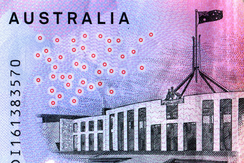 $5 note showing parliament house canberra