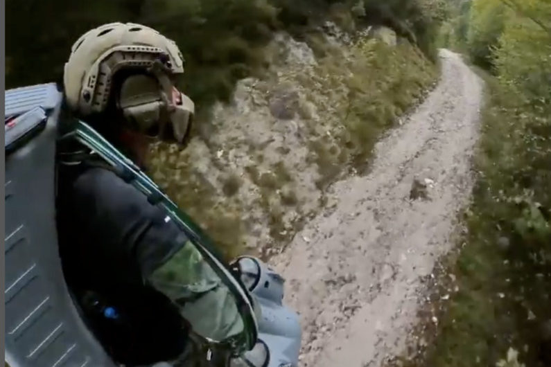 Watch a jet suit pilot deliver supplies in a mountain warfare rescue